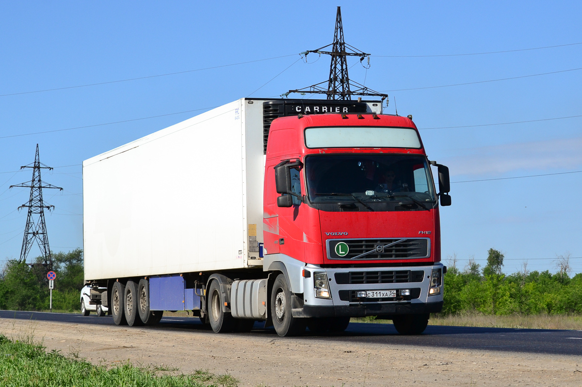 Волгоградская область, № С 311 ХА 34 — Volvo ('2002) FH12.420