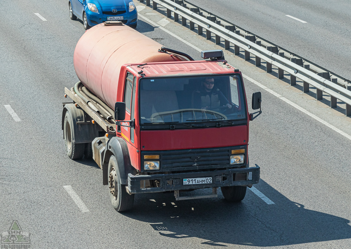 Алматы, № 911 AHM 02 — Ford Cargo ('1981)