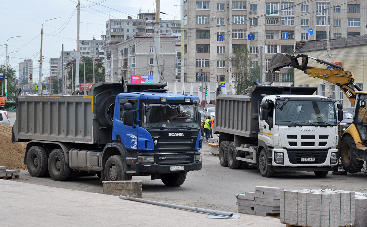Омская область, № Р 920 ВА 55 — Scania ('2004) P380; Омская область, № У 335 ОК 55 — Isuzu Giga CYZ