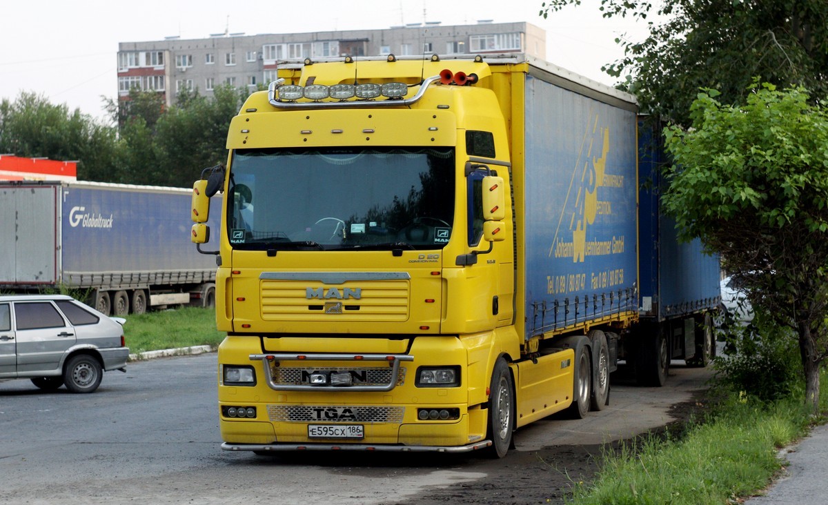 Ханты-Мансийский автоном.округ, № Е 595 СХ 186 — MAN TGA 26.430