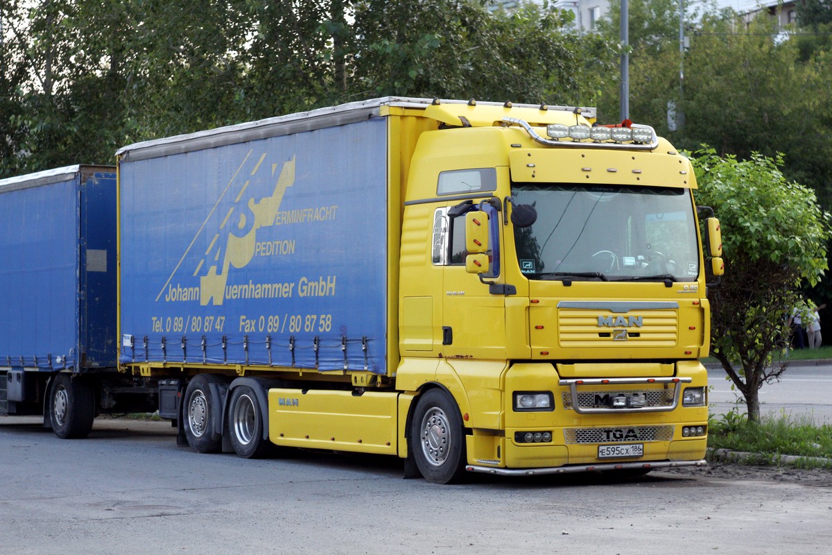 Ханты-Мансийский автоном.округ, № Е 595 СХ 186 — MAN TGA 26.430